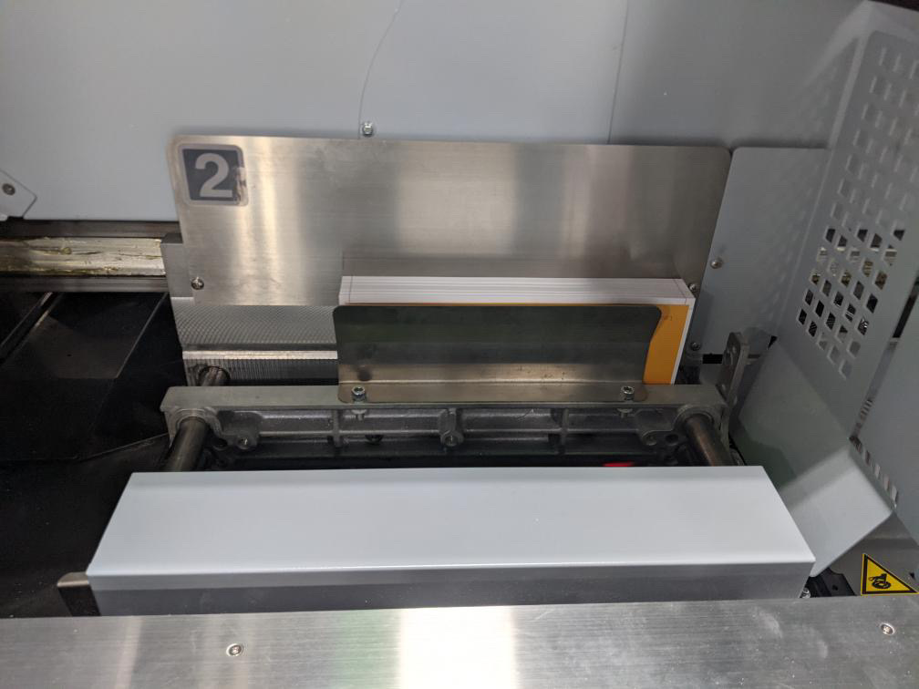 The PUR perfect-binding line inside Your Bindery Finishing